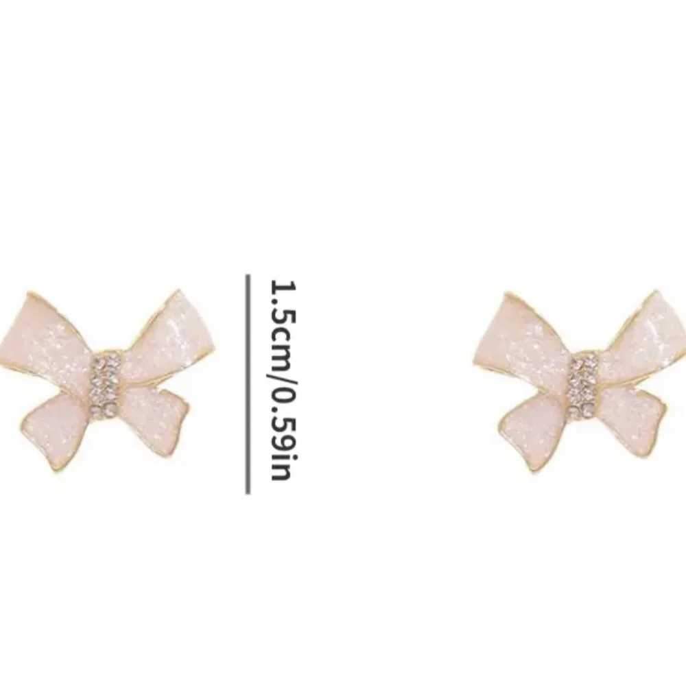 Cream Colored Gold Bow Earrings - Picture 6 of 8